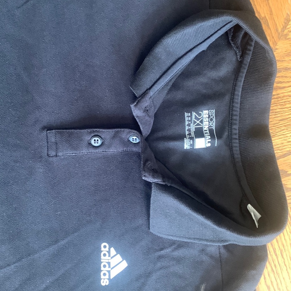 Adidas sport essential polo style shirt.